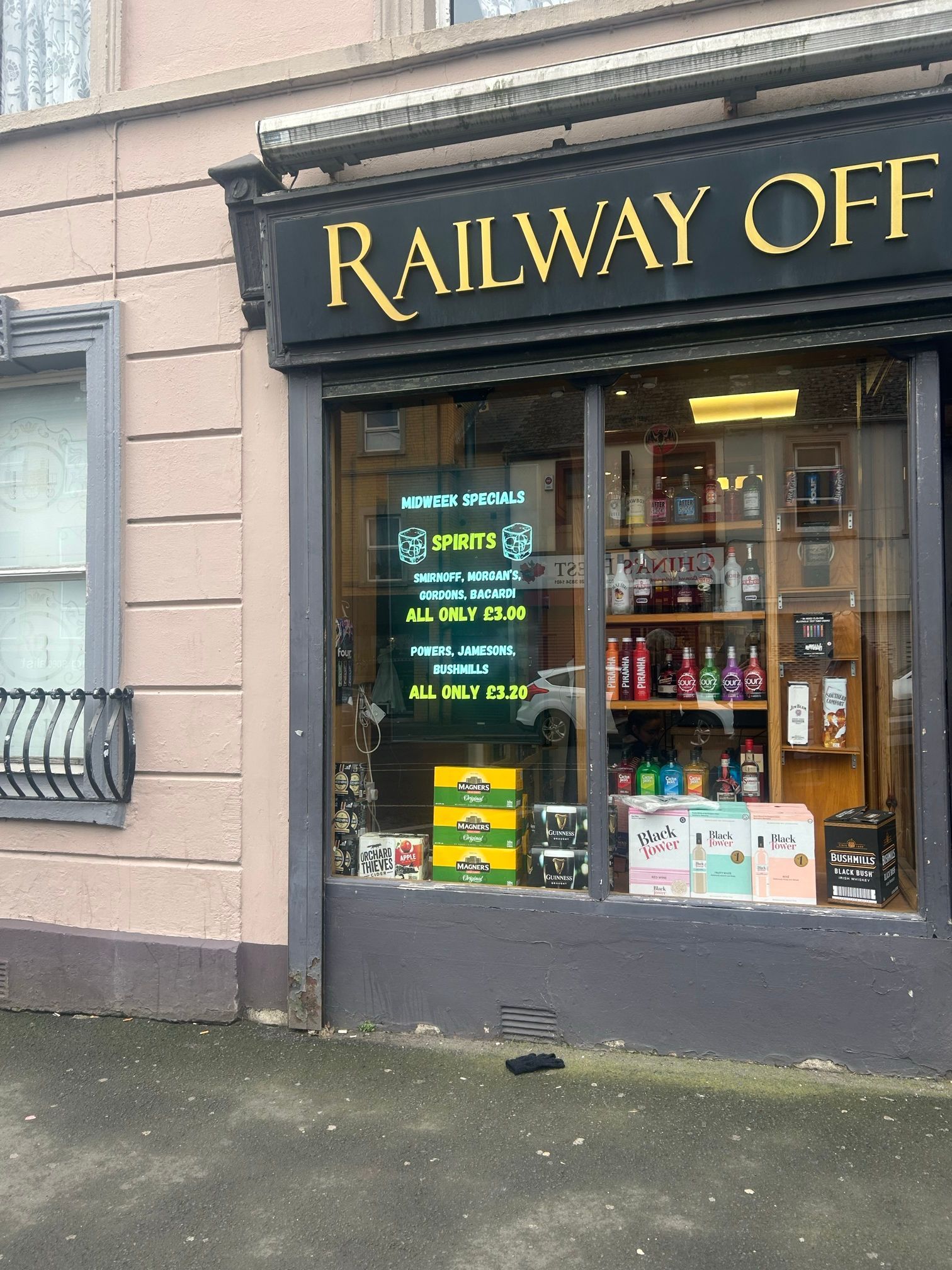 A store front with a sign that says railway office