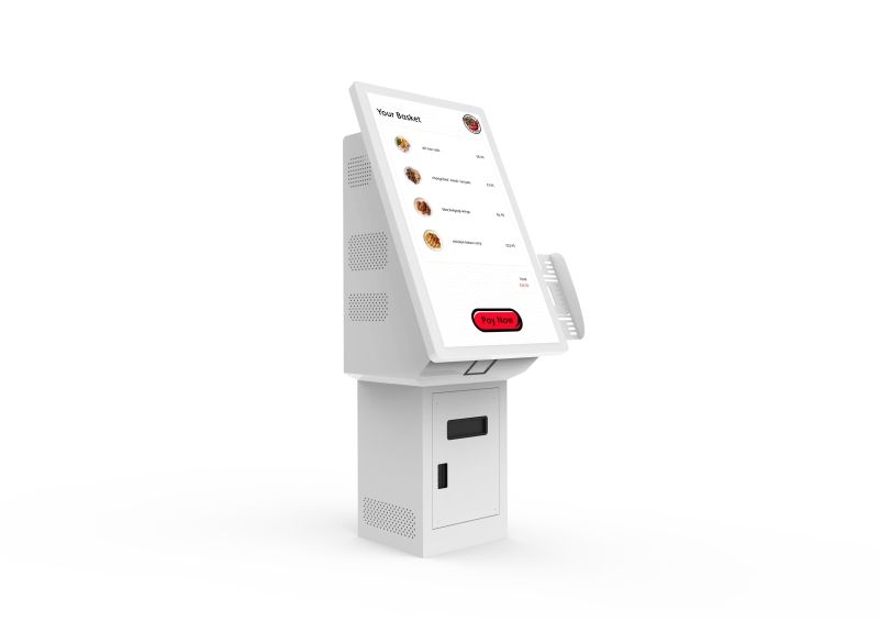 A white kiosk with a screen on top of it.