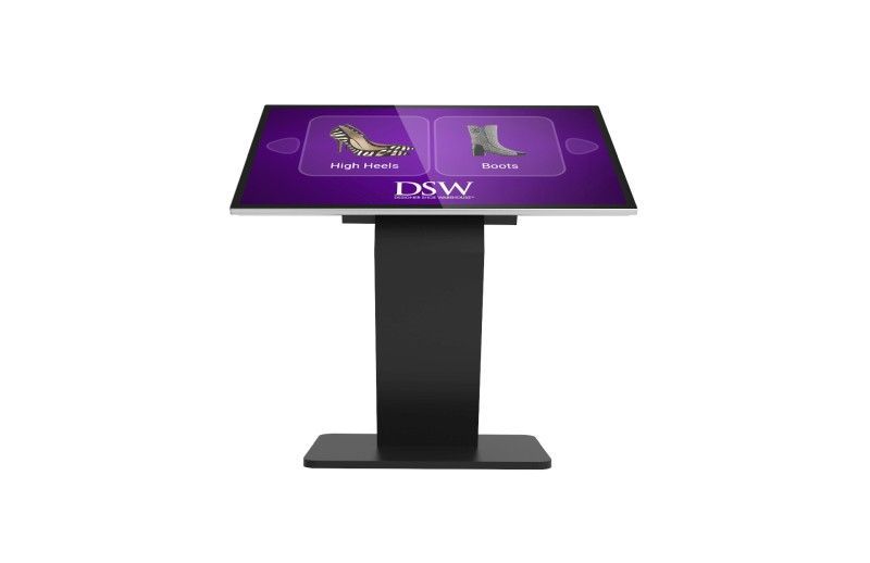 A touchscreen kiosk with a purple screen and a black base.