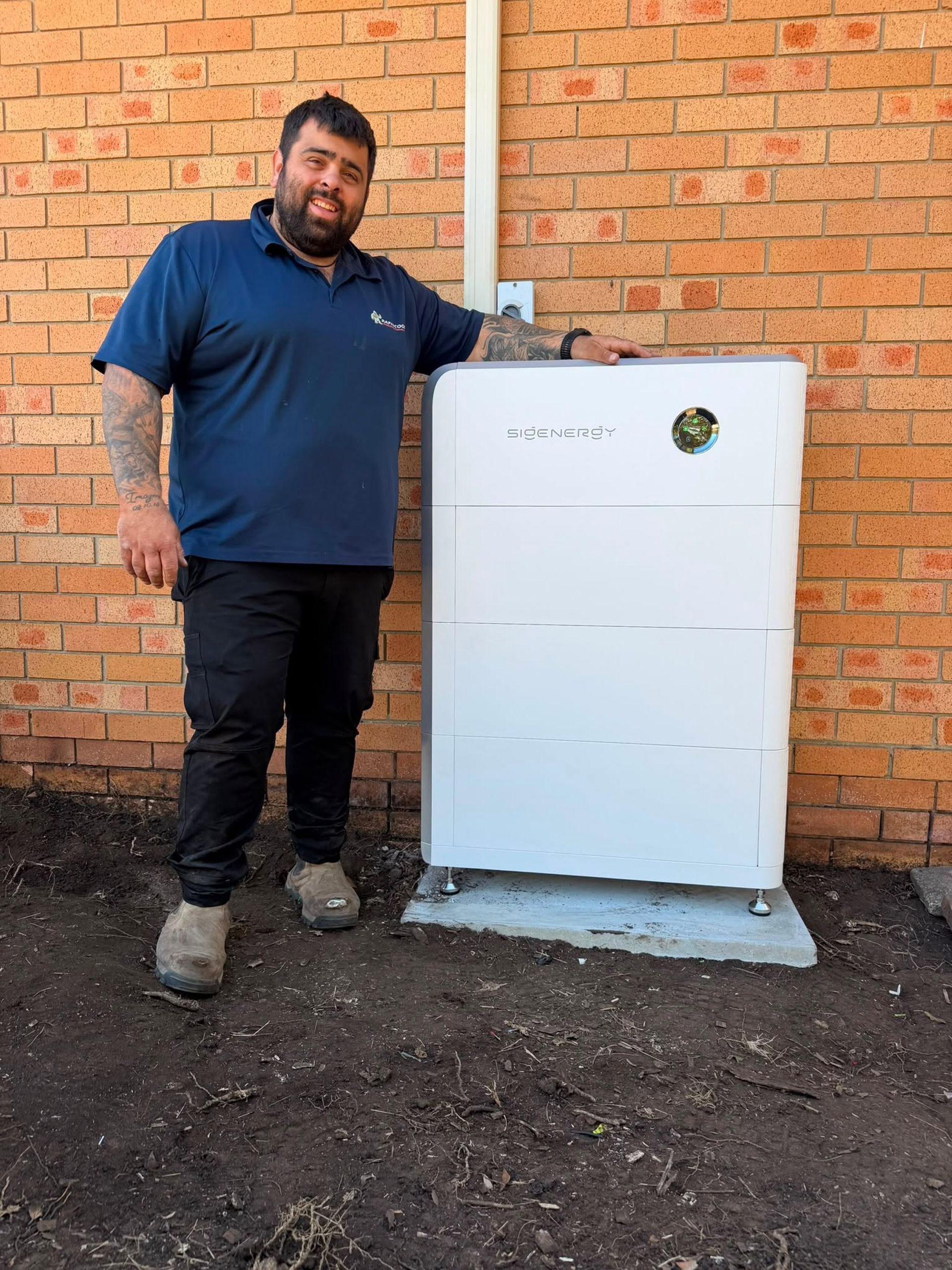 Man Standing Beside a White Outdoor Storage Cabinet — Rapidcool Air Conditioning, Electrical & Solar In Shellharbour, NSW