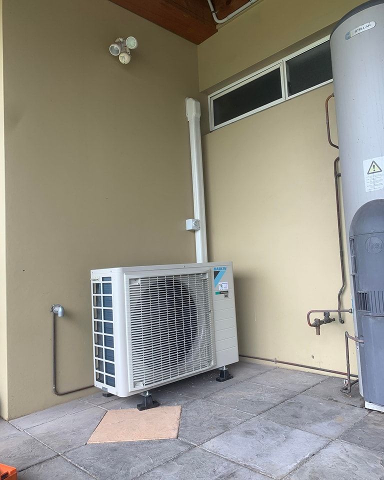 Residential Air Conditioning Wollongong Outdoor Air Conditioning Unit Installation Delivering Energy Efficient Cooling And Reliable Home Comfort — Rapidcool Air Conditioning, Electrical & Solar In Wollongong, NSW