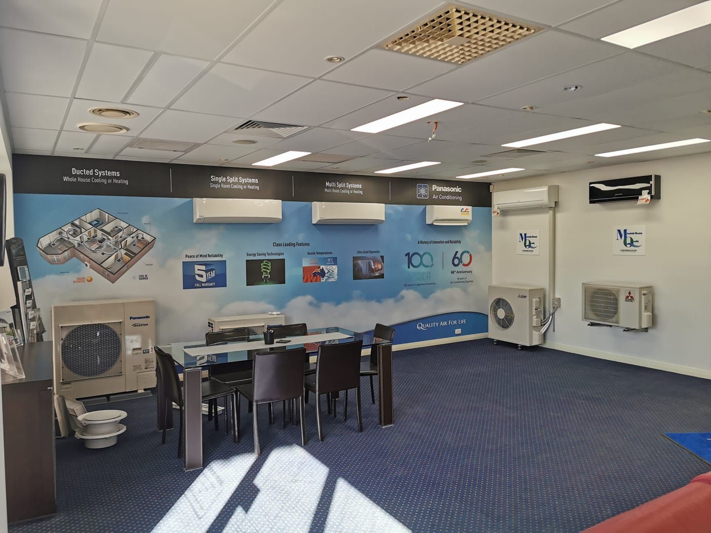 Blue-carpeted Training Room With Tables — Rapidcool Air Conditioning & Electrical In Wollongong, NSW