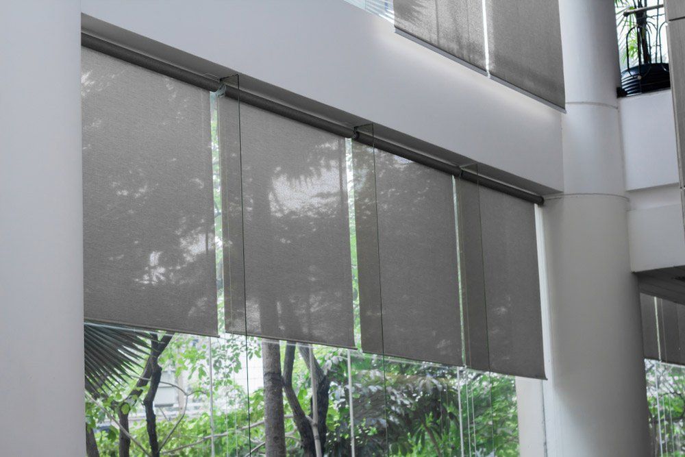 Long Blind For Sunlight Protection With Large Glass Wall — Ballarat Blinds & Curtains In Wendouree, VIC