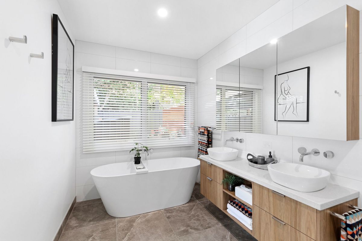 Bathroom window with the Watson Roll Blinds — Ballarat Blinds & Curtains In Wendouree, VIC