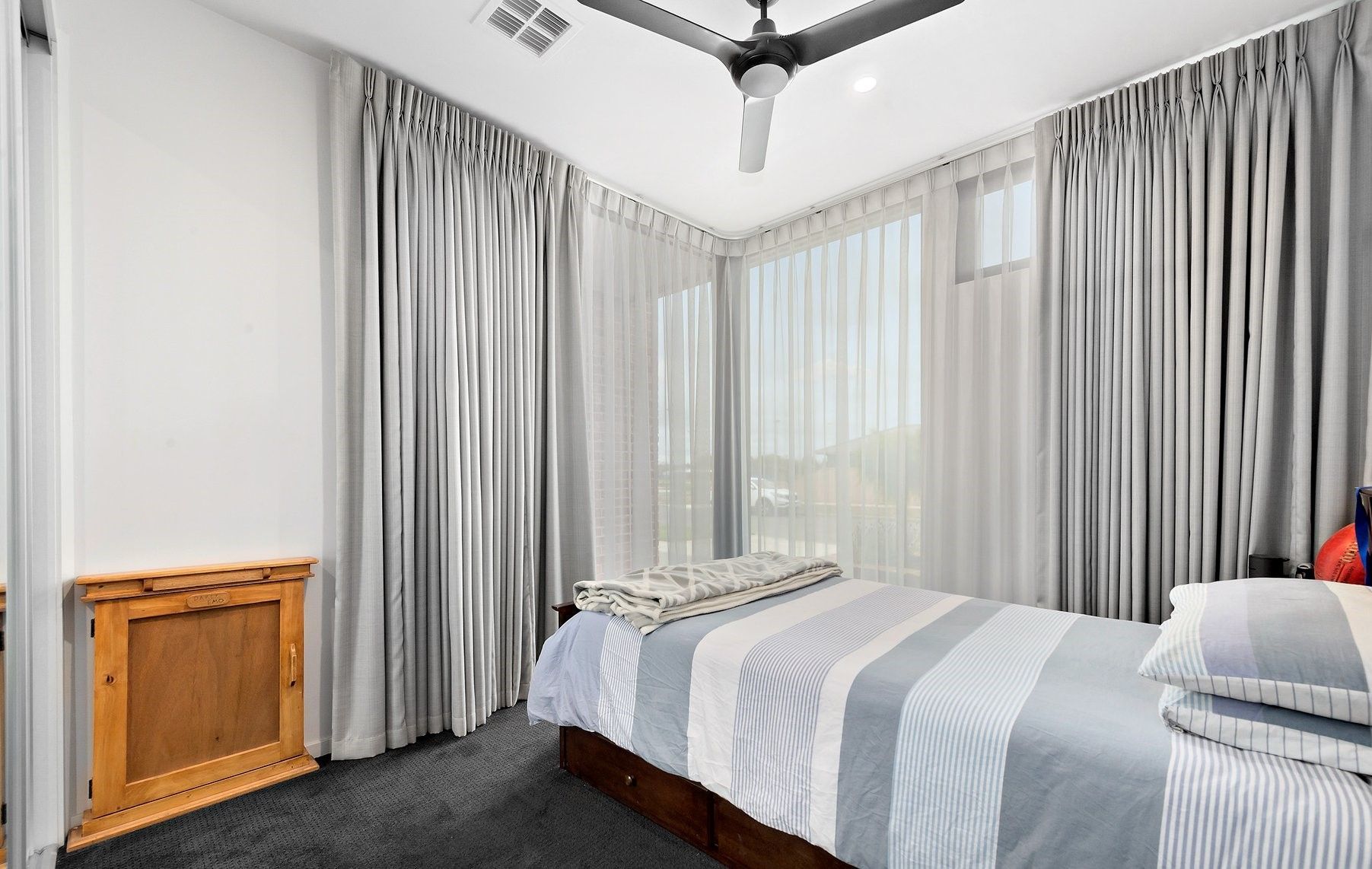 Bed And Room Window With White Grey Curtains — Ballarat Blinds & Curtains In Wendouree, VIC