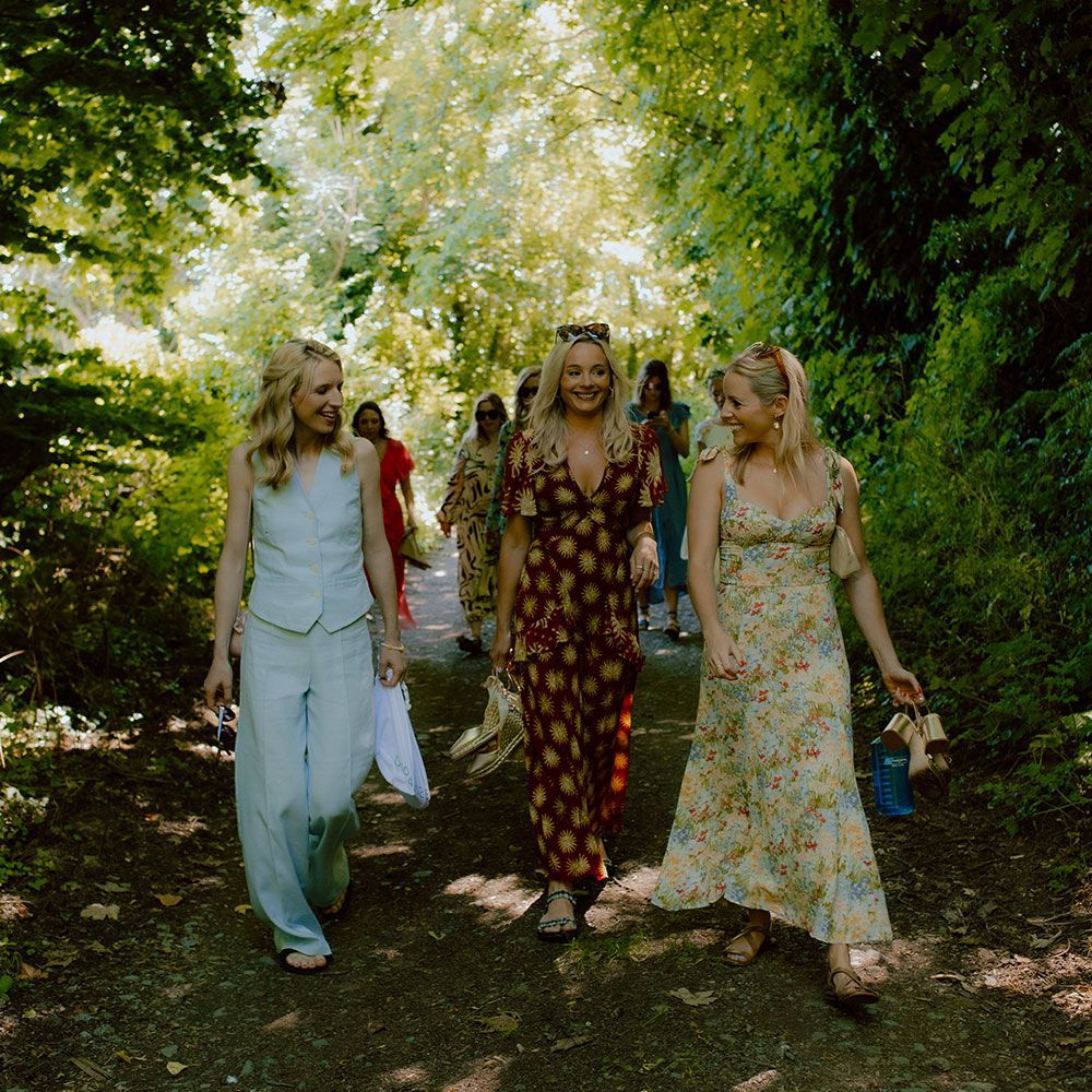 Guests walking through the grounds at The Grain Store in South Devon.