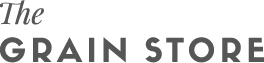 Logo for The Grain Store. Dark grey text on white background.