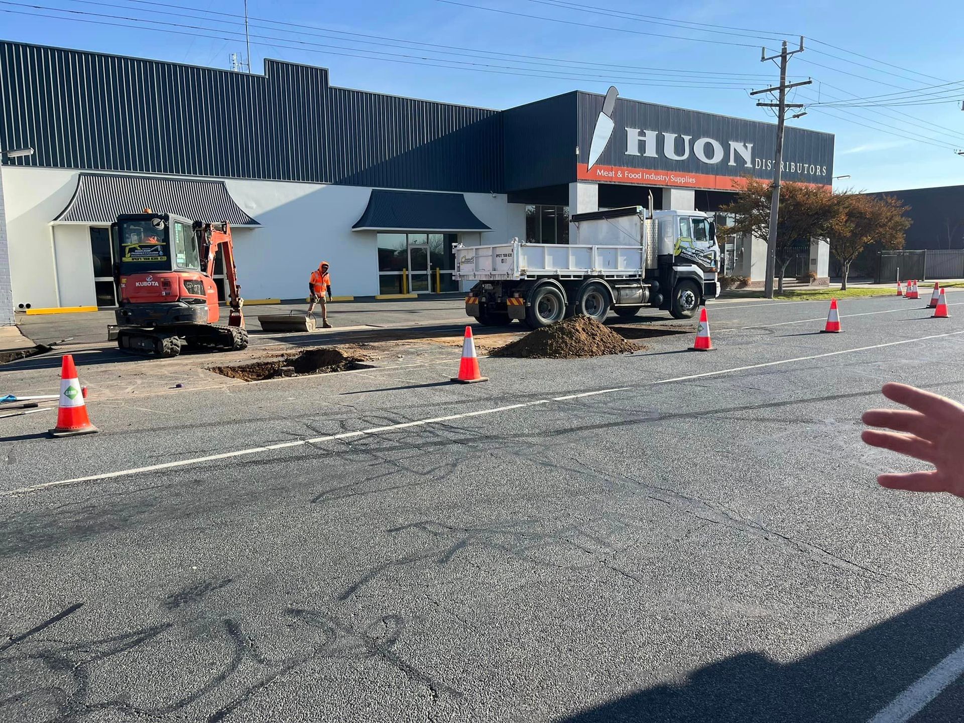 Construction Site With a Mini Excavator, and Dump Truck — Donaldson Plumbing & Excavations in Chiltern, VIC