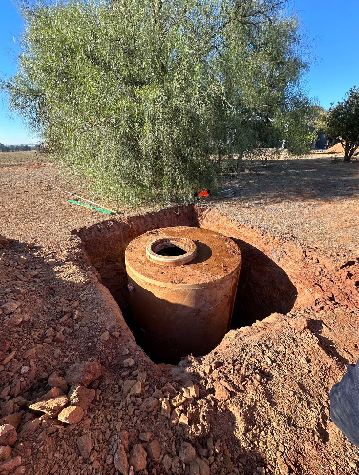 A cylindrical Concrete Structure in an Excavated Hole — Donaldson Plumbing & Excavations in Baranduda, VIC