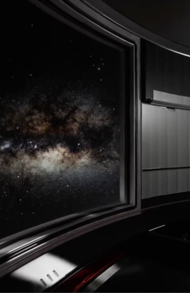 View of a star-filled galaxy through a large curved window in a dark modern interior