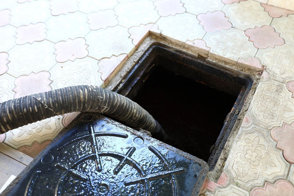 A Manhole is Getting Cleared — FlowWise in Coolum, QLD