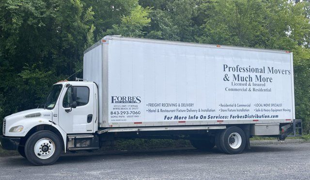 White moving truck with business name 