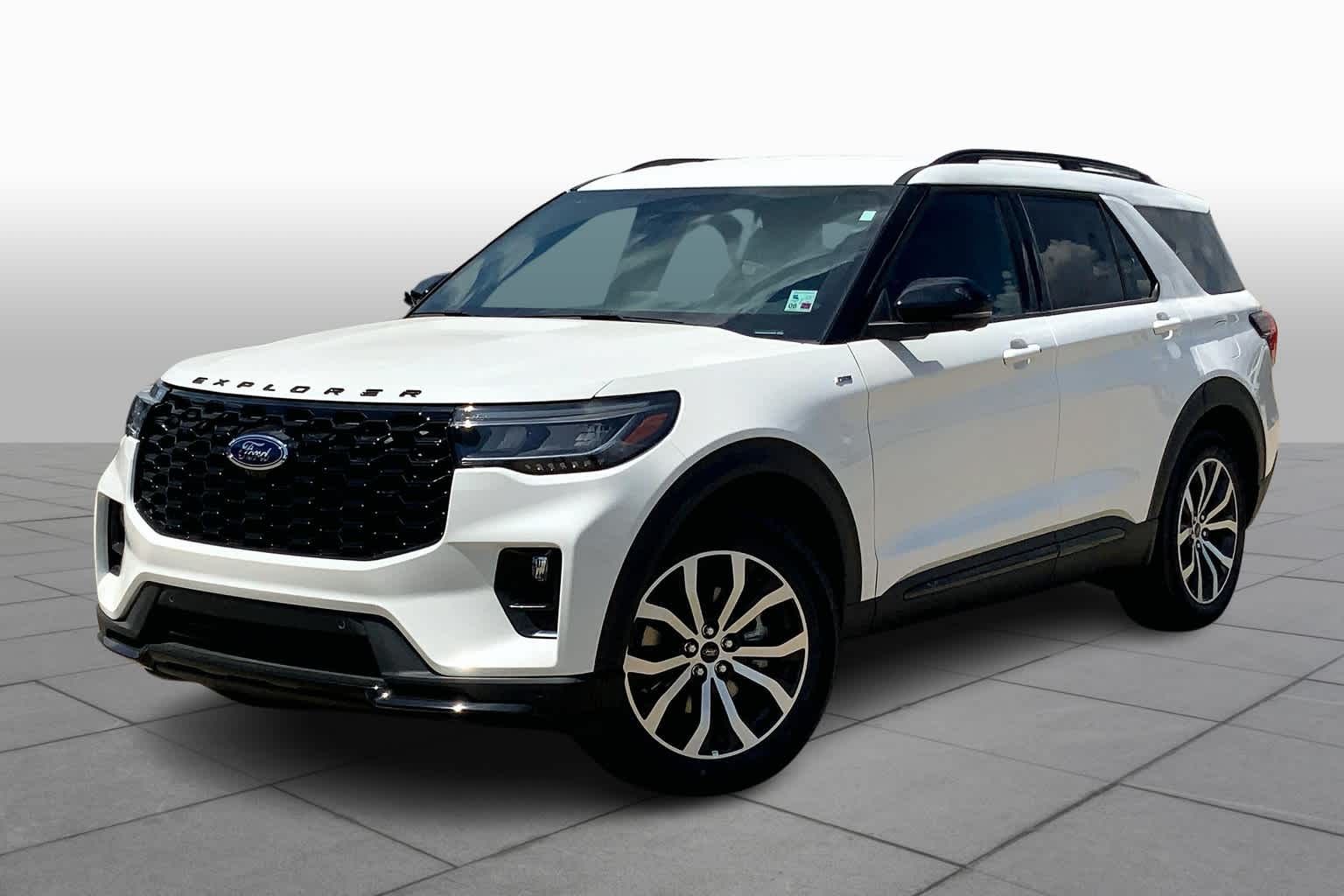 White SUV angled on a light gray studio background