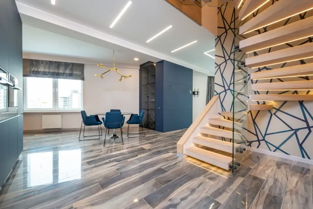 There is a spiral staircase in the middle of the room.