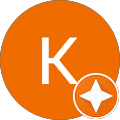The letter k is in an orange circle with a white star.