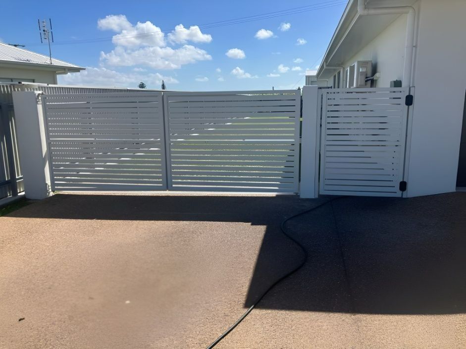 White Horizontal Slat Gate With a Single Matching Pedestrian Gate — Gate-O-Matic in Garbutt, QLD