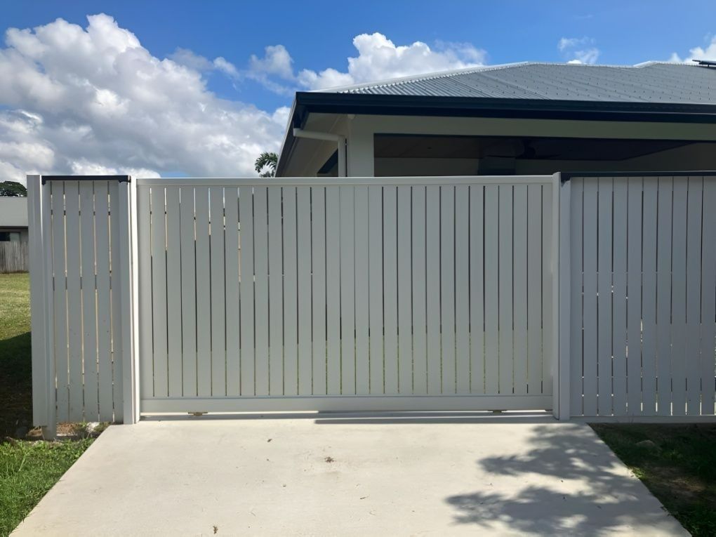 A White, Horizontal-slat Sliding Gate — Gate-O-Matic in Garbutt, QLD