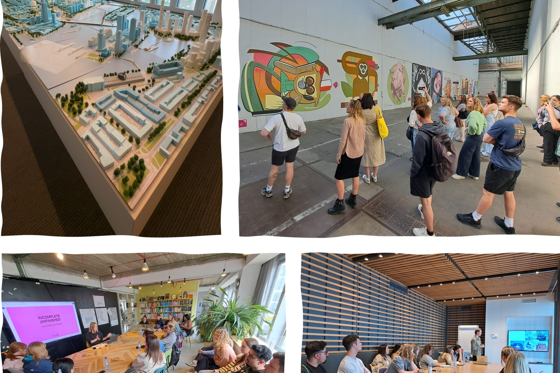 Group touring an indoor exhibit with colorful murals and a model display in a bright gallery.