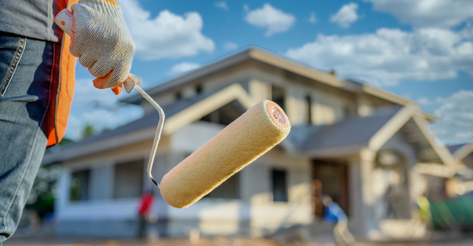 Painter Holding a Paint Roller
