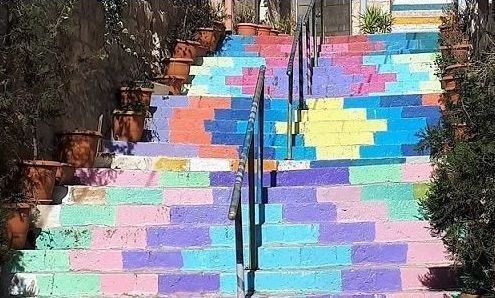 Colorful painted steps with a zig-zag design.