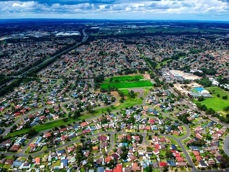 An Aerial View of A Residential Area with Lots of Houses and Trees — Bondi Removals and Taxi Trucks in Sydney, NSW