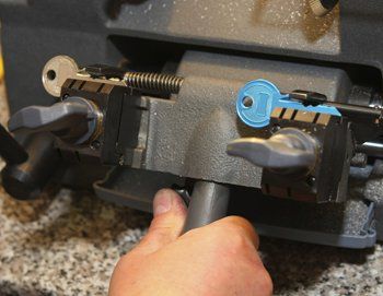 Locksmith making spare key