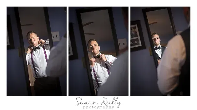Three-panel mirror portrait of a man in a white shirt adjusting his tie in a dimly lit room