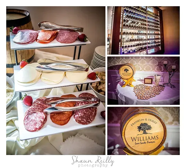 Dessert buffet with layered cakes, sliced salami, and wine in a warm event setting