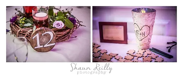 Candles in decorative glass holders on a pink, floral table setting with the number 12 centerpiece
