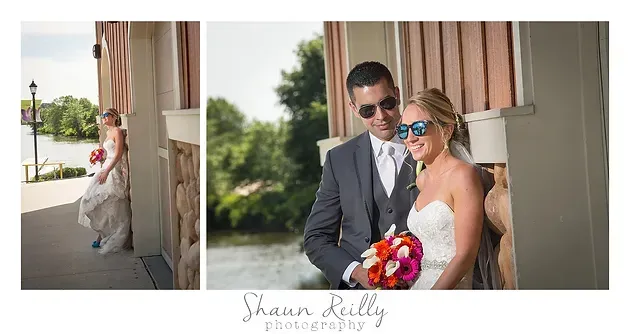 Bride and groom pose in a sunlit outdoor wedding portrait, bride holding pink bouquet.