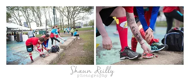 Runners tying shoelaces at a park trail start line before a race