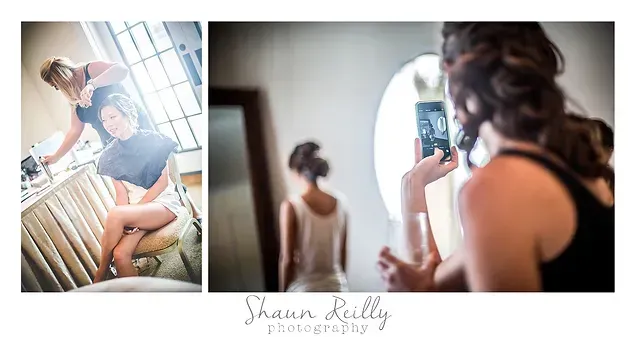 Split photo of a woman in a white dress by a window and another woman taking her picture on a phone.