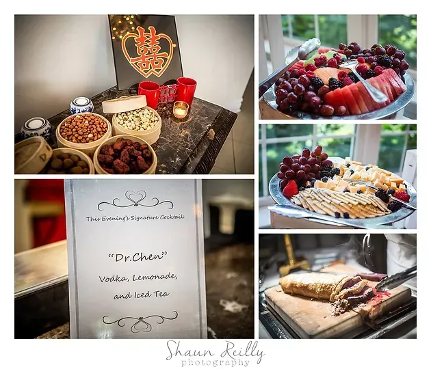 Dessert buffet table with assorted pastries, berries, and a sign at an elegant wedding reception