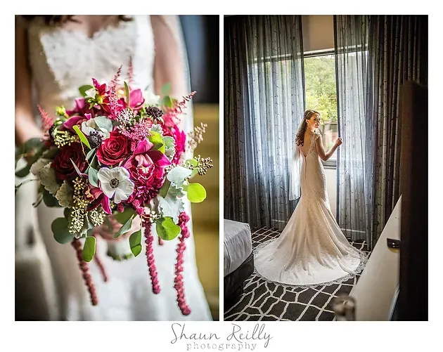 Bride holding bright pink and white bouquet; bride in ivory gown by window in softly lit room