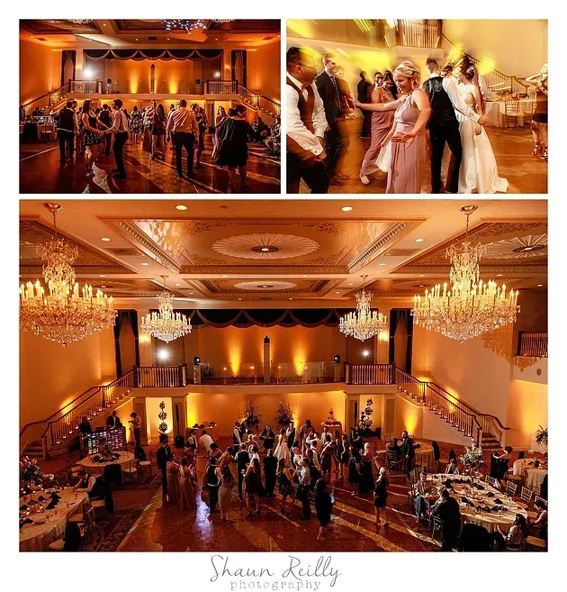 Elegant ballroom wedding reception with chandeliers and guests dancing in warm golden lighting