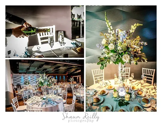 Elegant white-and-blue floral reception tablescapes with candles and banquet seating in a decorated venue
