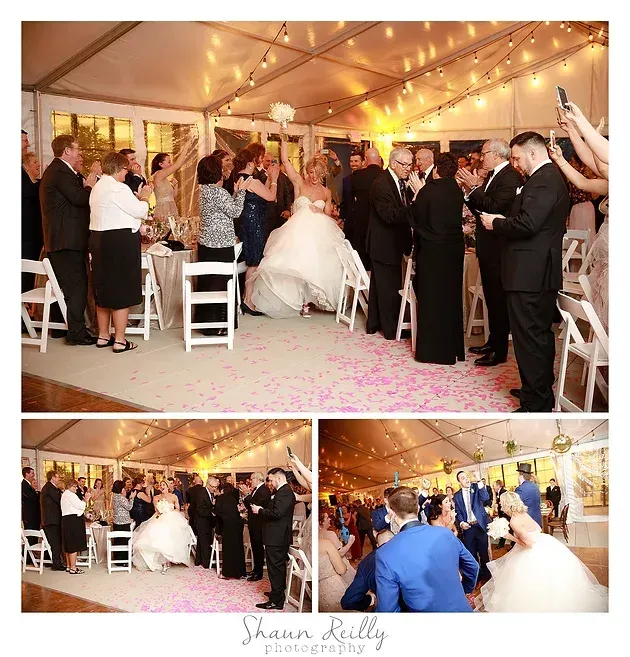 Wedding couple in a tent reception, guests applauding under string lights and a blue-lit dance floor