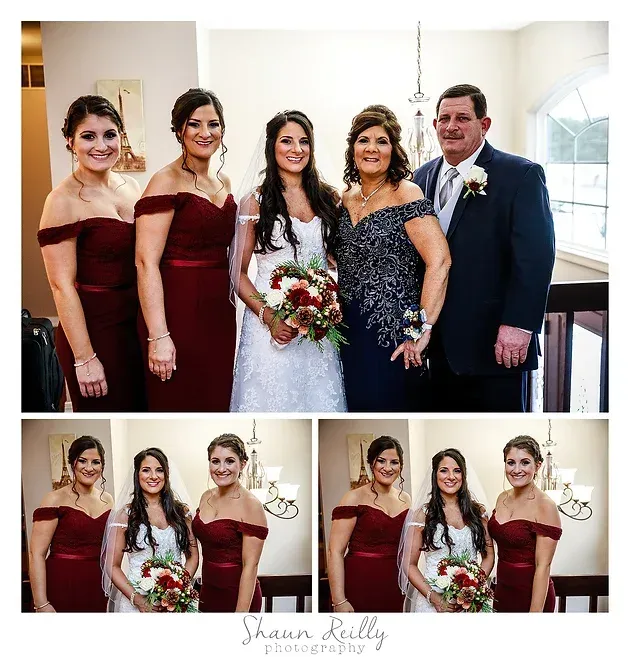 Wedding party portrait with bride in white, bridesmaids in burgundy, and family posing indoors