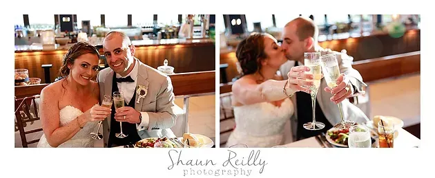 Wedding couple toasting champagne at a reception table with a dessert display