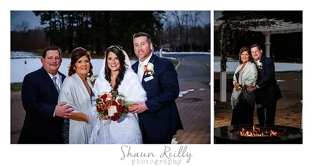 Wedding couple with two guests posing outdoors at dusk near a lit fountain