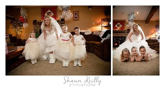 Bride with three children in white dresses posing in a festive living room
