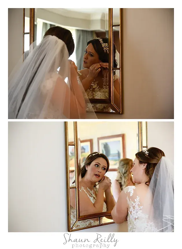 Bride and bridesmaid adjusting makeup in a mirror before the wedding