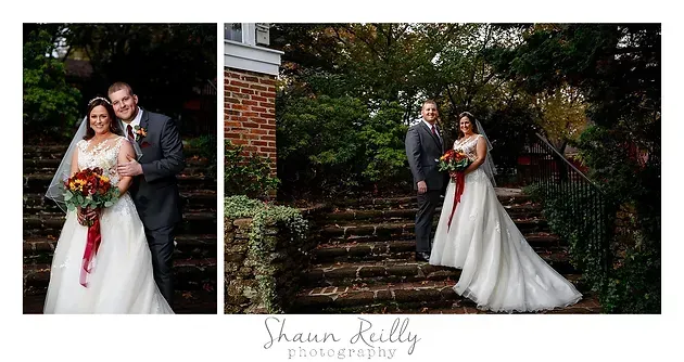Bride and groom posing outdoors in a garden, bride in white gown holding bouquet, groom in dark suit.