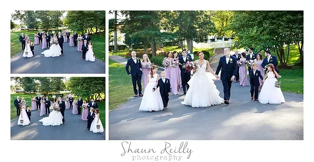 Bridesmaids and bride posing outdoors in white dresses and dark suits at a garden wedding ceremony