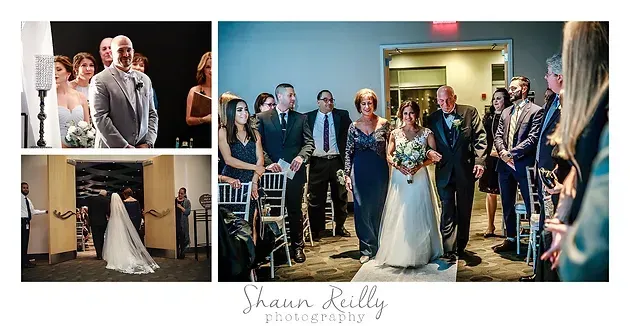 Wedding party in a church aisle as the bride and groom enter, guests standing and watching.