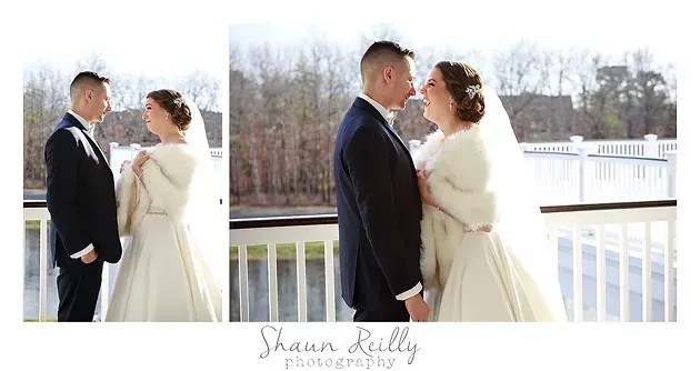 Bride and groom standing close on a white bridge in winter sunlight, kissing softly