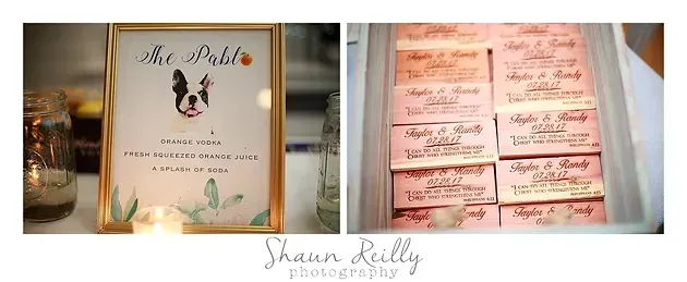 Wedding signs with gold frames and pink menu cards on a table