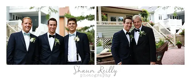 Three men in tuxedos pose together at an outdoor wedding venue