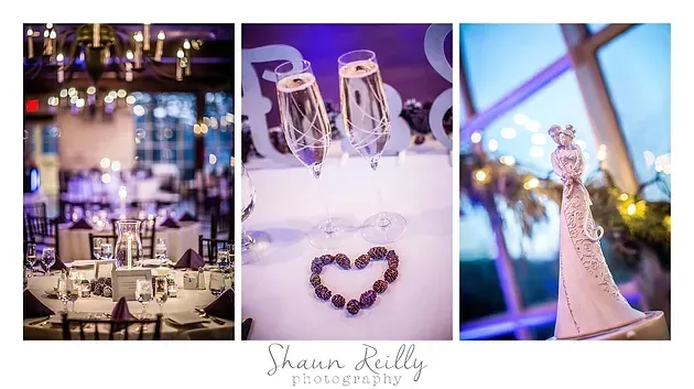 Elegant wedding reception decor with champagne glasses, heart decorations, and a white wedding dress display