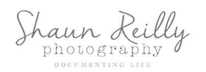 Logo for Shaun Reilly Photography with a cursive gray name and small serif tagline